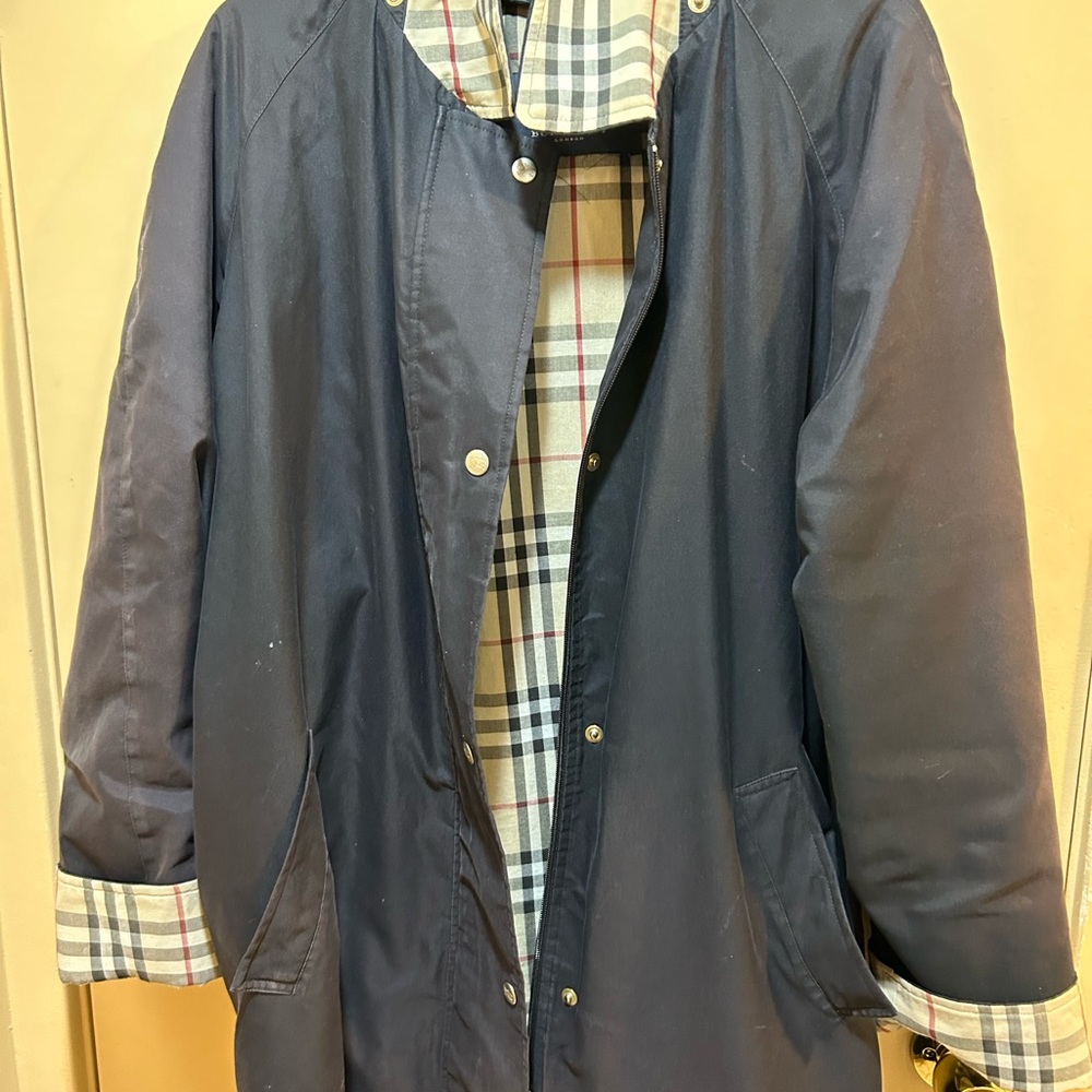 This Burberry coat is used, but is still stylish.